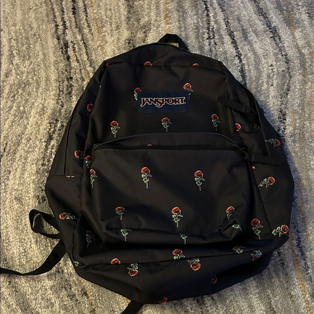 JanSport Black with Red Floral women’s backpack used lightly